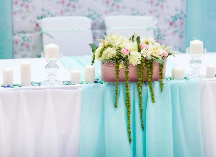 Multi-colored tulle skirt in the decoration of the wedding table