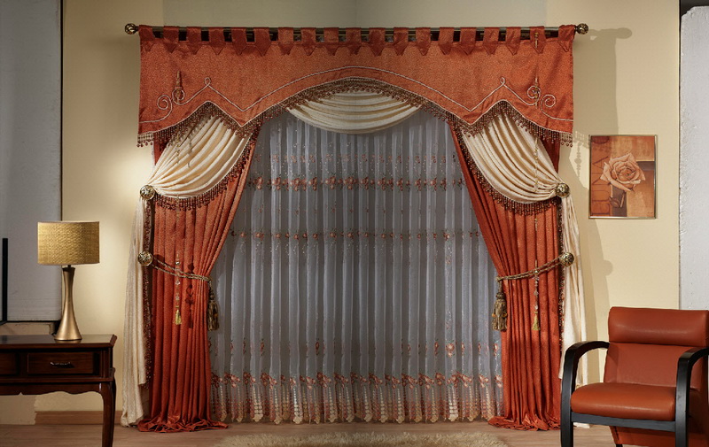 Blackout curtains with pelmet on a low window in the living room