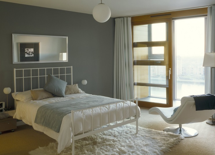 Interior of one-room apartments in gray tones