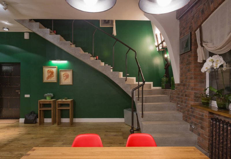Concrete staircase in an industrial style house interior