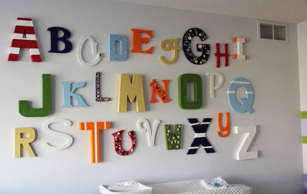 Colored foam letters on the wall of a living room