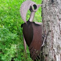 Decorative woodpecker from old glands
