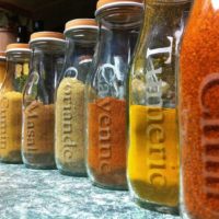 Colored sand bottles in a kitchen decoration