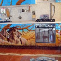 Airbrushing on the facade of a kitchen set