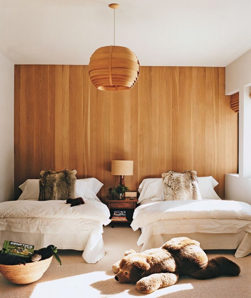 Wall decoration in the bedroom with decorative wood panels
