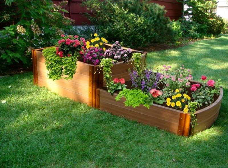 Homemade wooden flowerbed for flowers