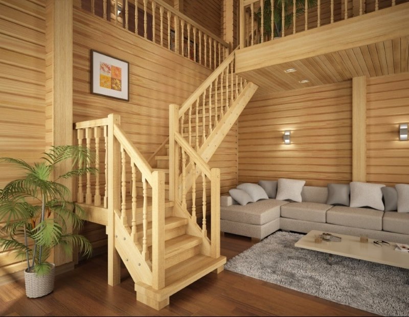 Wooden staircase from pine in the interior of the living room of a private house