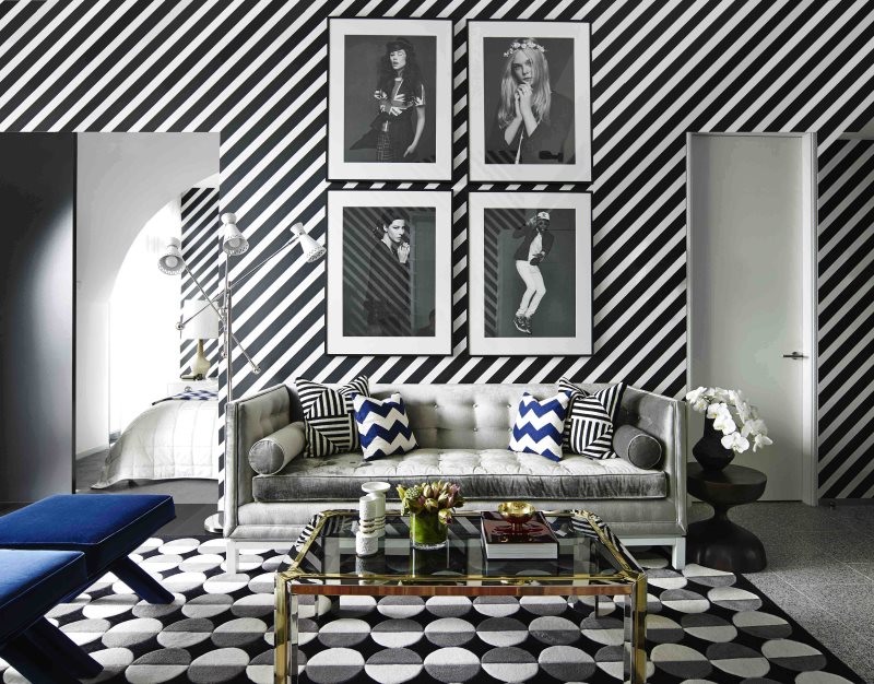 Wallpaper with diagonal stripes in the interior of a modern living room