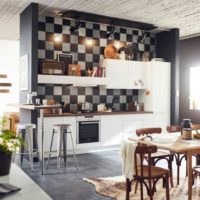 Colored mosaic tiles in the design of kitchen walls