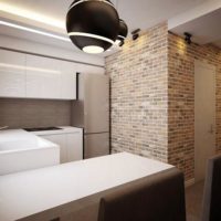 Brick wall in the loft style in odnushka's kitchen