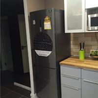 Place for a refrigerator in the kitchen of a studio apartment