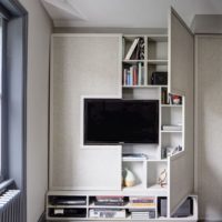 Combined furniture in the design of a studio apartment
