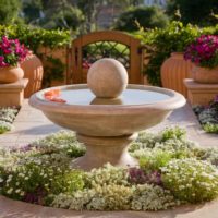 Decorative fountain in the shape of a bowl in the garden decor