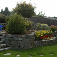 Stone retaining walls in a slope area