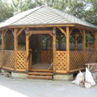 Wooden arbor in a rustic style