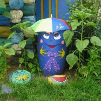 Decorating the garden with painted stones