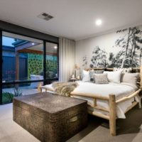 Homemade wooden bed in bedroom design