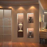 Antique vases in niches with extra lighting