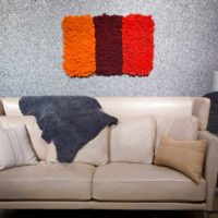 Colored moss as a wall decoration over the sofa