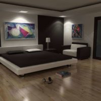 Spacious bed on the wooden floor in the bedroom