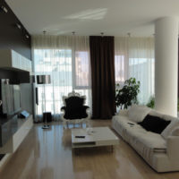 White sofa and black living room furniture