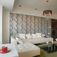 Modern living room with wallpaper on the wall
