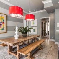Red lights and gray stripes on the dining room wall
