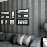 Dark stripes on the wallpaper in the design of the living room