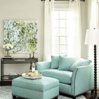 Upholstered mint furniture in the interior of the living room