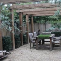 Wooden pergola above the sitting area