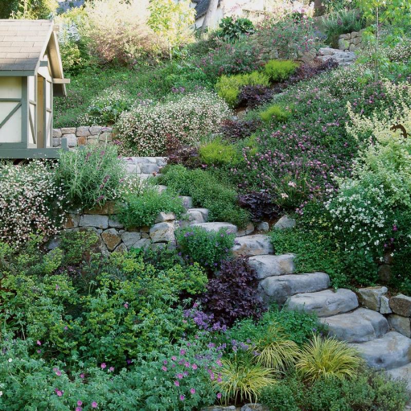 Stone stairs on a steep slope of a suburban area