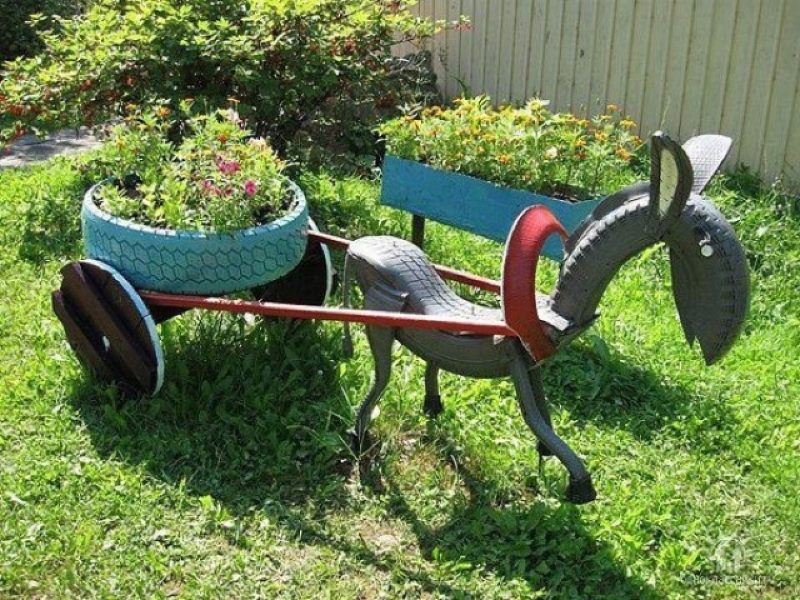 Do-it-yourself donkey with a cart in the shape of a flower bed