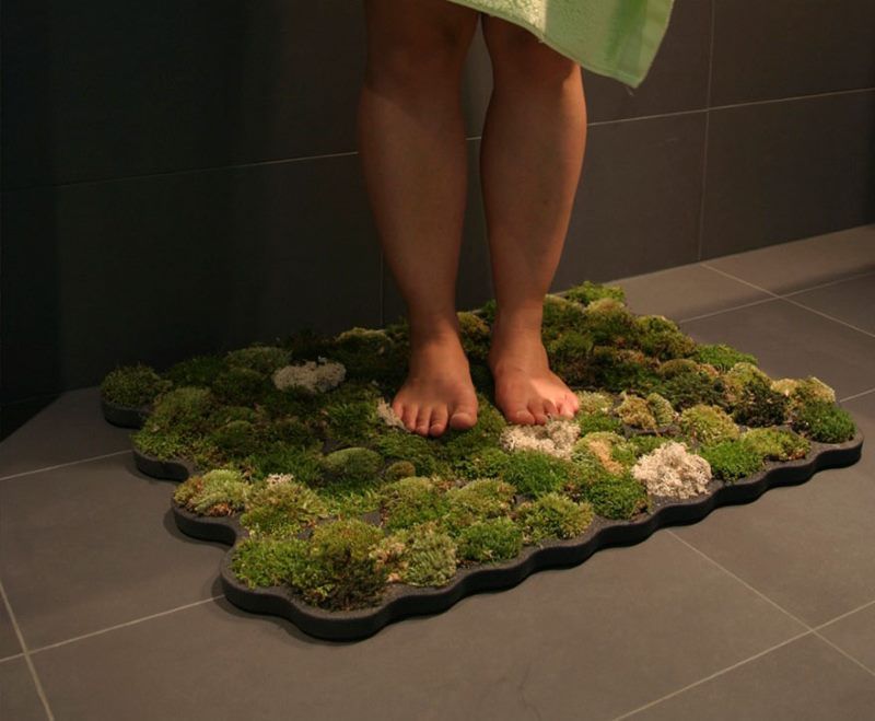 Natural moss mat on the bathroom floor