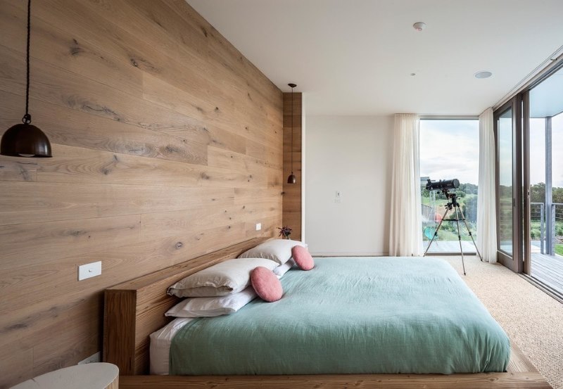 Wall decoration in the bedroom with a laminate under a tree