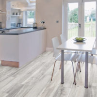 Laminate in the interior of the kitchen-living room of a private house