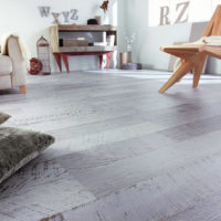 Imitation of frayed planks on the living room floor
