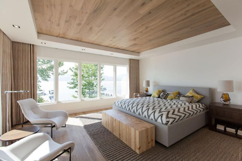 Minimalist bedroom interior with laminate on the ceiling