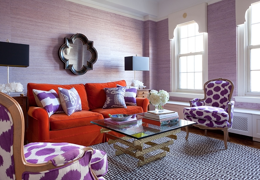 Carrot sofa in a room with lavender walls