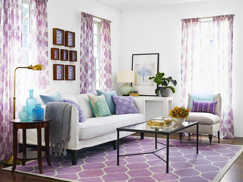 White sofa in the living room with lavender textiles
