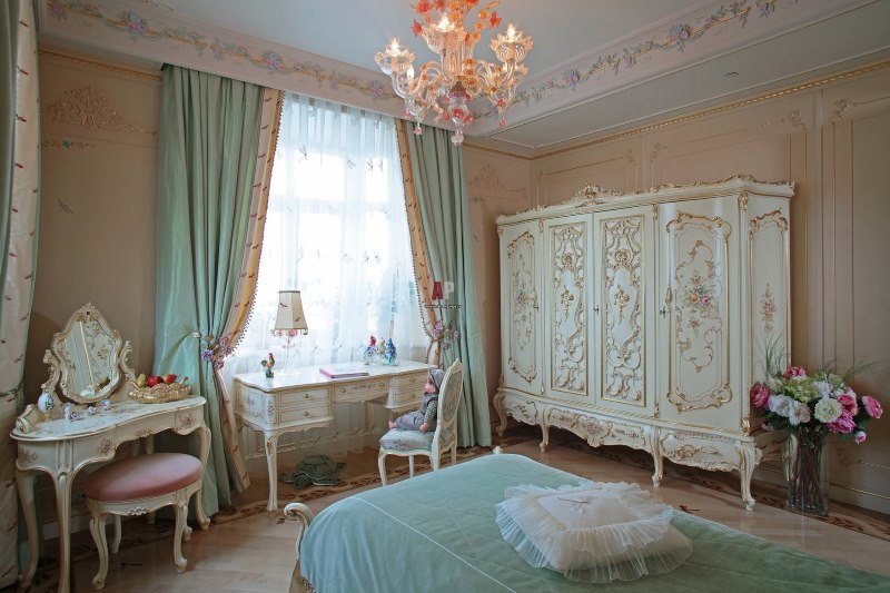 Interior of a children's room for a girl with stucco decoration