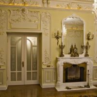 Stucco molding in fireplace portal decoration