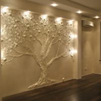 Wall lighting with plaster moldings
