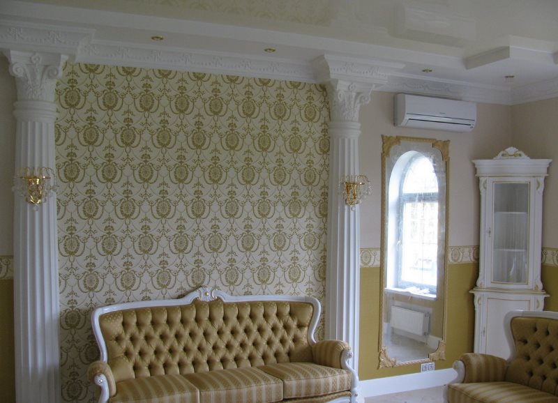 Plaster stucco molding in the design of the living room