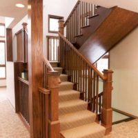 Massive wooden staircase to the second floor of a private house