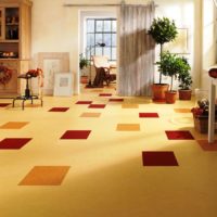 Sand-colored linoleum in the design of the living room