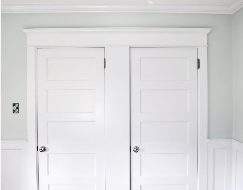 Doorway trim with white moldings