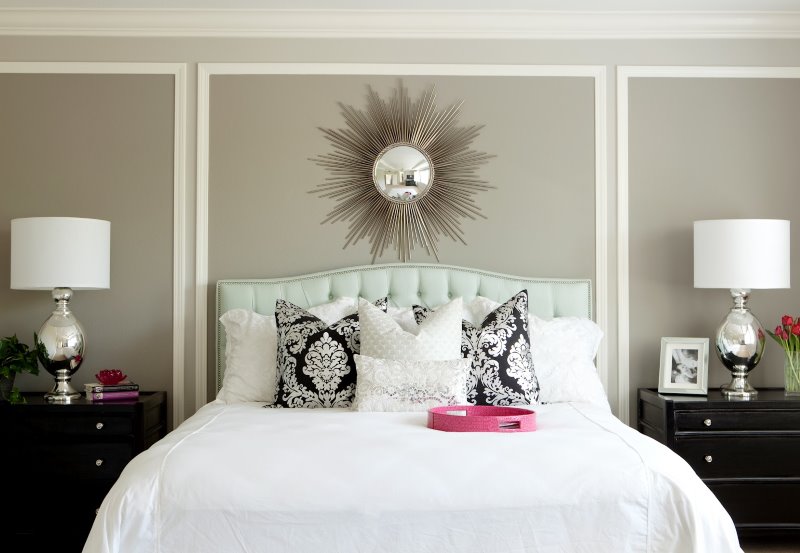 White moldings on a gray wall in a bedroom