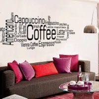 Lettering over the sofa in the design of the living room