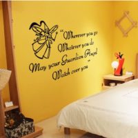 The inscription in black font on the yellow wall of the bedroom