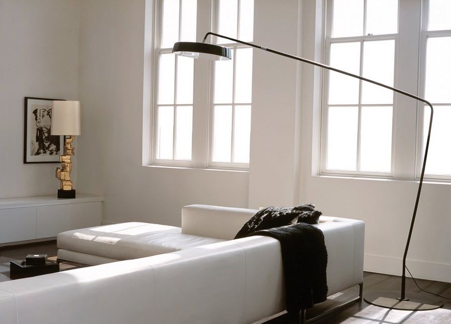 Bright living room with designer floor lamp